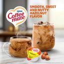 Coffee-Mate Hazelnut Creamer Liquid Creamer - 0.375 oz. cup, 180 cups per case